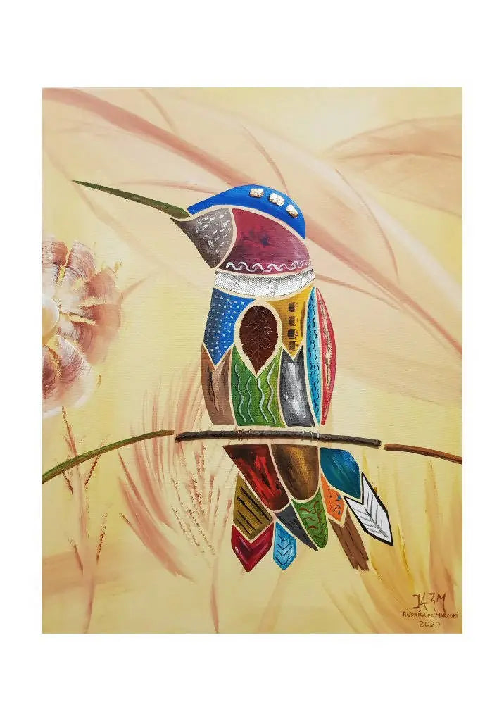 Colibrí descansando en una rama